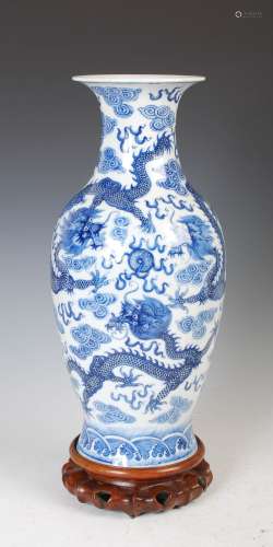 A Chinese porcelain blue and white dragon vase, Qing Dynasty...
