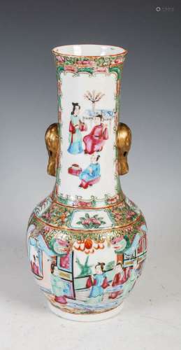 A Chinese porcelain famille rose Canton bottle vase, Qing Dy...