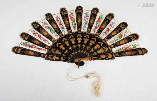 A Chinese lacquer and silkwork fan, Qing Dynasty, with eleve...