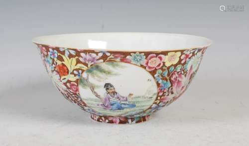 A Chinese porcelain famille rose millefleurs footed bowl, Qi...