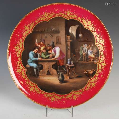 A Vienna porcelain hand-painted circular charger, decorated ...