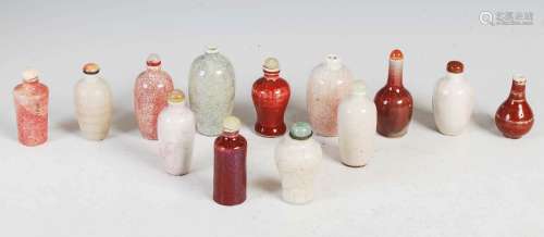 A collection of thirteen Chinese porcelain monochrome snuff ...