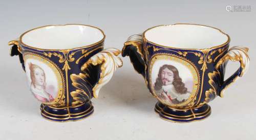 A pair of Sevres porcelain blue ground twin handled jardinie...