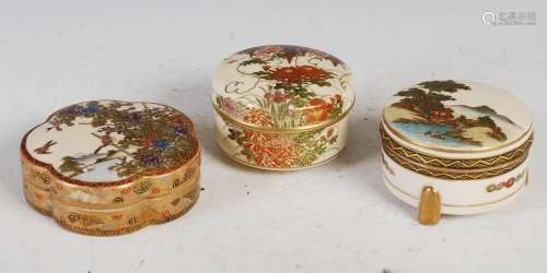 A group of three Japanese Satsuma pottery boxes and covers, ...