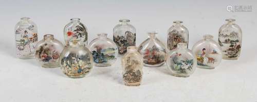 A collection of twelve Chinese inside painted glass snuff bo...
