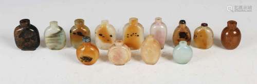 A collection of thirteen Chinese polished stone snuff bottle...