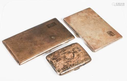 Three assorted early 20th century silver cigarette cases, co...