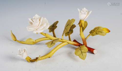 A Chinese ivory and stained ivory rose branch, late 19th/ ea...