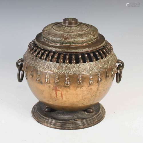 A Chinese bronze twin handled censer and cover, Qing Dynasty...