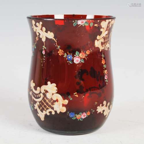 A late 19th century Bohemian ruby glass tumbler, with enamel...