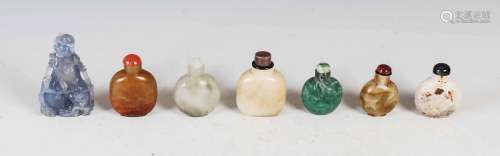 A collection of seven Chinese stone snuff bottles, Qing Dyna...