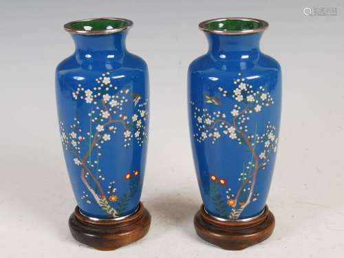 A Pair of Japanese blue ground cloisonne vases, late 19th/ e...