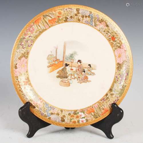 A Japanese Satsuma pottery plate, Mieji Period, decorated wi...