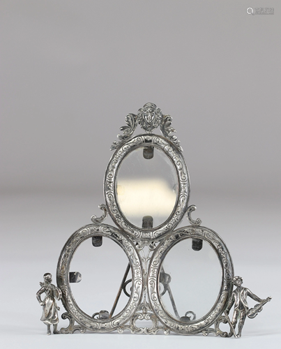 Silver frame decorated with musical characters