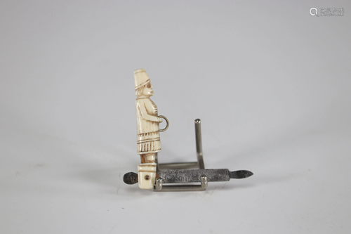 Miniature file carved with a 19th century character