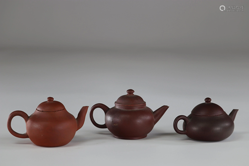 Chinese teapots (set of 3) In Terracotta Yixing marks