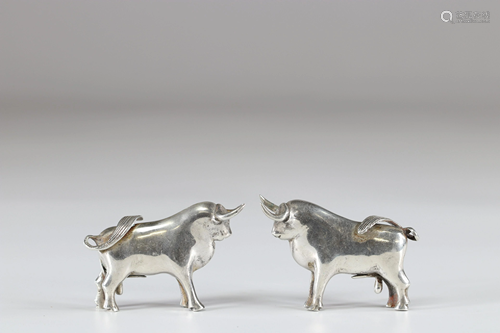 Pair of silver bulls