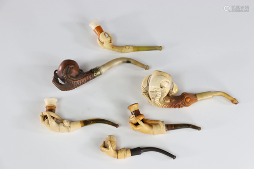 Lot of 5 foam and amber pipes decorated with hands and