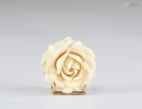 Ivory pendant carved with a rose circa 1900