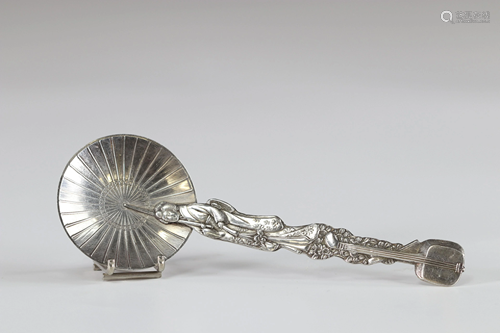 Silver spoon representing a geisha with an umbrella