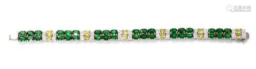 A white gold two row chrome diopside, yellow sapphire and di...