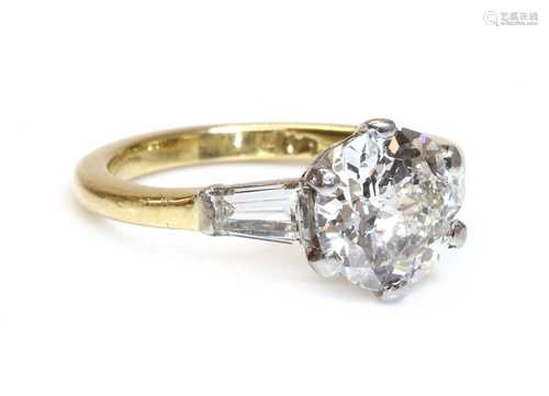 A single stone diamond ring with a jubilee crown cut diamond...