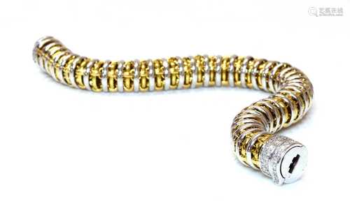 A two coloured gold diamond set bracelet,