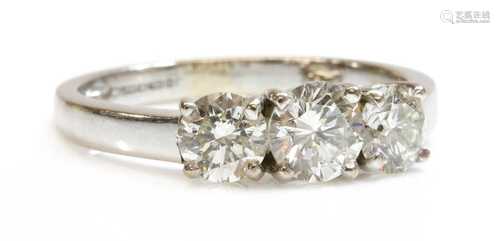 An 18ct gold three stone diamond ring,