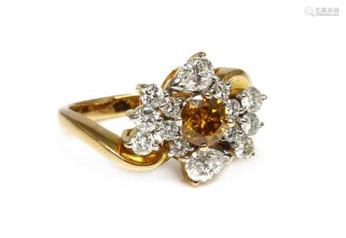 A gold diamond cluster crossover ring,