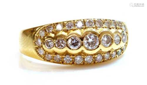 A diamond set tapered band ring,