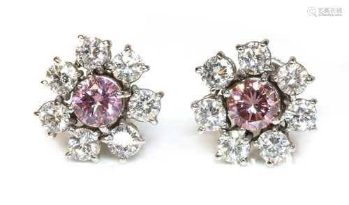 A pair of fancy pink diamond and diamond cluster earrings,