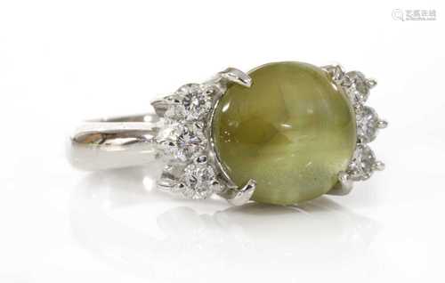 A platinum single stone chrysoberyl cat's eye ring,