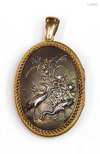 A Shakudo double sided oval hinged locket, c.1880,