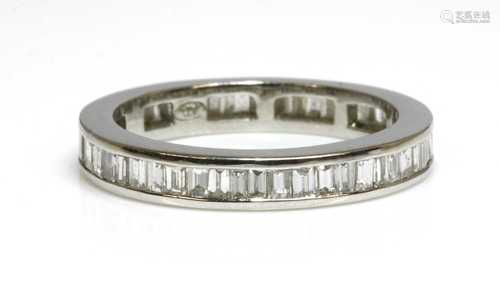 A platinum diamond set full eternity ring,