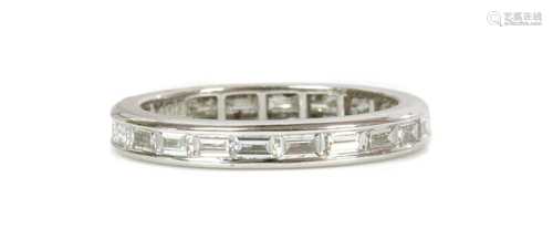 An 18ct white gold diamond set full eternity ring,