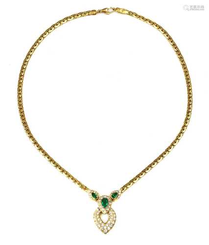 An 18ct gold emerald and diamond necklace, by Garrard & Co.,...