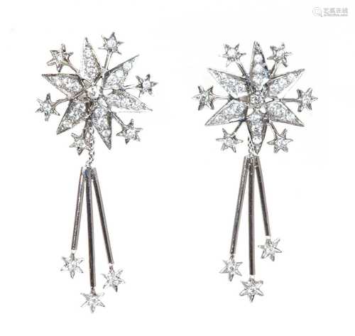 A pair of 18ct white gold diamond set star burst drop earrin...