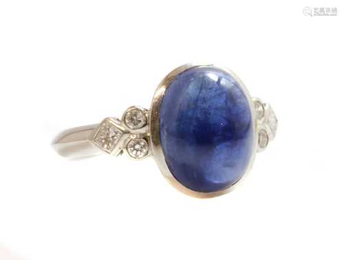 A single stone cabochon sapphire ring,