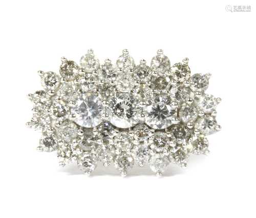 A white gold diamond cluster ring,