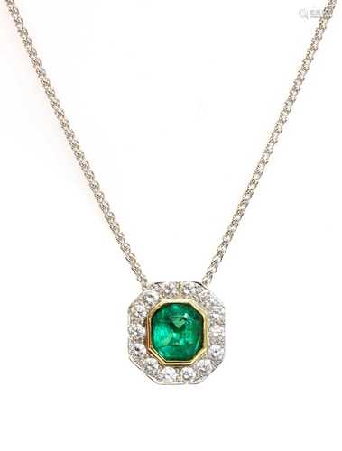 A two colour gold emerald and diamond octagonal cluster pend...