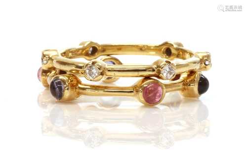 Two gold diamond and gem set stacking rings, by Ilias Lalaou...