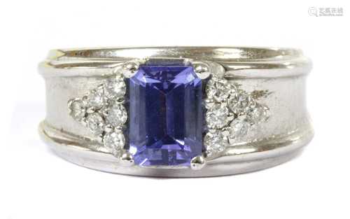 A Continental white gold tanzanite and diamond band ring,