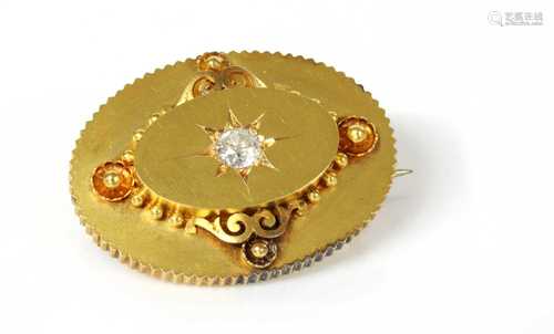 A Victorian gold diamond set oval shield form brooch, c.1870...