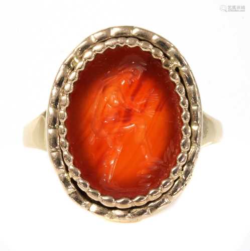 A Georgian gentlemen's cornelian intaglio engraved gold ring...