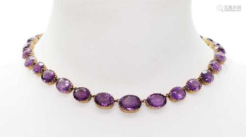 A late Victorian graduated amethyst rivière necklace,