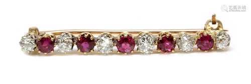 A ruby and diamond two colour bar brooch,