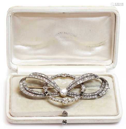 A cased former Austro-Hungarian diamond set bow and hoop bro...