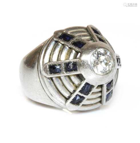 A diamond and synthetic sapphire bombé ring, c.1940,