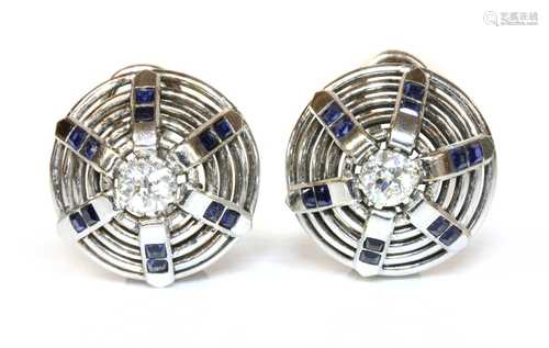 A pair of white gold diamond and synthetic sapphire bombé ea...