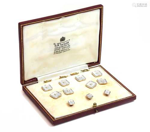 A cased 18ct gold pearl and mother-of-pearl dress set, by Cr...